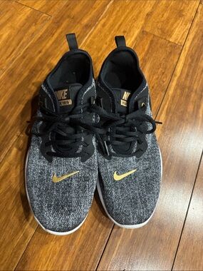 Nike Black and Grey Knit Sneakers with Gold Swoosh